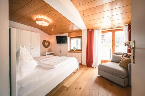 Postel nebo postele na pokoji v ubytování casa wii