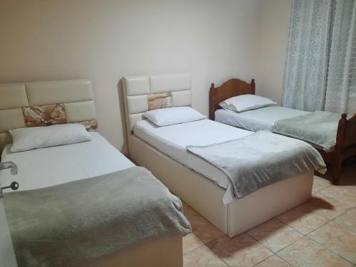 Llit o llits en una habitació de Central apartment A&E