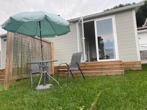 Κήπος έξω από το Somo Bungalow Resort - Camping Latas
