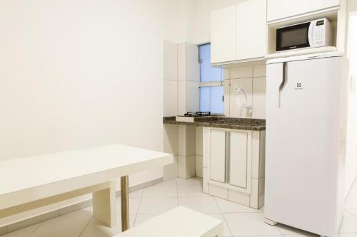 Dapur atau dapur kecil di Dr. Marinho Apart Hotel