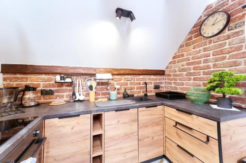 Η κουζίνα ή μικρή κουζίνα στο Apartamenty Sowi Most