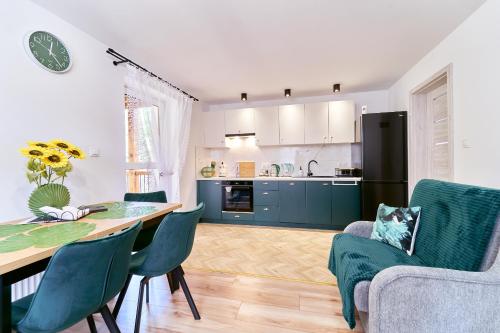 Η κουζίνα ή μικρή κουζίνα στο Apartamenty Sowi Most