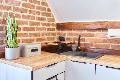 Η κουζίνα ή μικρή κουζίνα στο Apartamenty Sowi Most