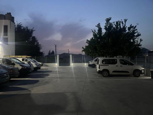 a parking lot with several cars parked in it at Hotel Santa Fe in Santa Fe