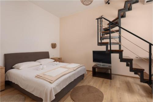 Katil atau katil-katil dalam bilik di Apartman Oasis