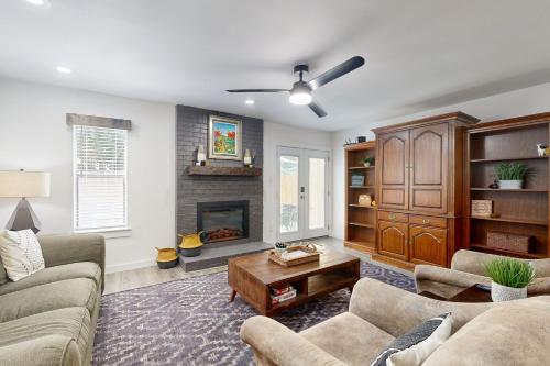 a living room with a couch and a fireplace at South Austin Life in Austin