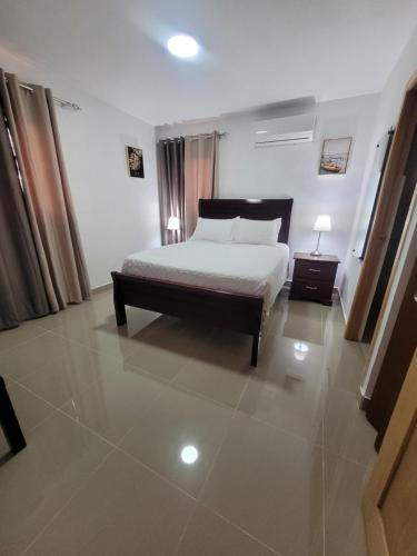 Una cama o camas en una habitación de Comfortable house