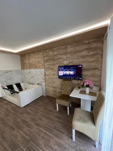 TV a/nebo společenská místnost v ubytování 5 star apartment