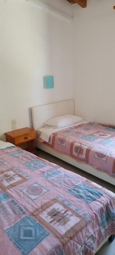Ένα ή περισσότερα κρεβάτια σε δωμάτιο στο Kaiti Villa 4