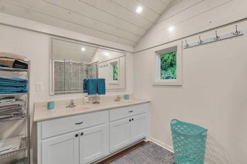 a bathroom with a sink and a mirror at Pet-Friendly Pickens Vacation Rental with Fire Pit in Sunset