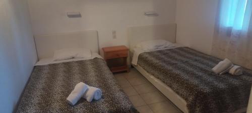 Ένα ή περισσότερα κρεβάτια σε δωμάτιο στο Kaiti Villa 4