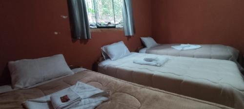 Ένα ή περισσότερα κρεβάτια σε δωμάτιο στο Etrita Inkas Hostel