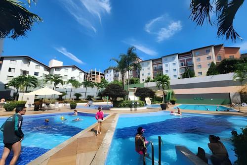 an artist rendering of a swimming pool at a resort at Apartamentos em Rio Quente com maravilhosa área de lazer e excelente localização in Rio Quente