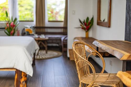 Postel nebo postele na pokoji v ubytování ECOTICA Boutique Hotel