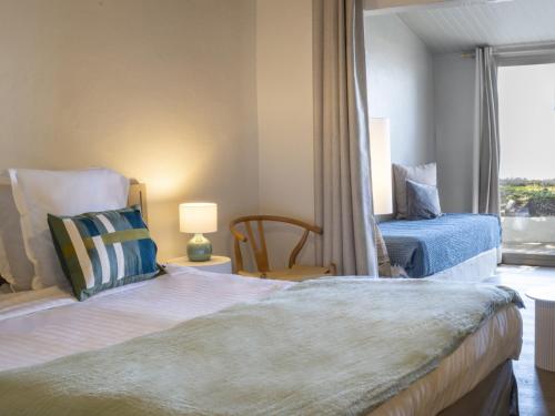 Postel nebo postele na pokoji v ubytování Hotel Punta Lara Noirmoutier