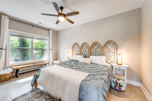 a bedroom with a bed and a ceiling fan at Brand-New Perry House with Kayaks and Lake Access in Perry