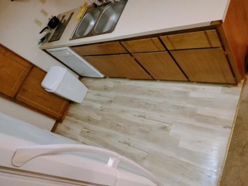 a bathroom with a sink and a toilet at Golden Sunflower's Apt A in Lawton