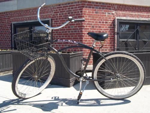 a bike parked in front of a brick building at The Jane Hotel in New York