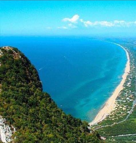 an aerial view of a beach and the ocean at Villa Sabaudia in Sabaudia