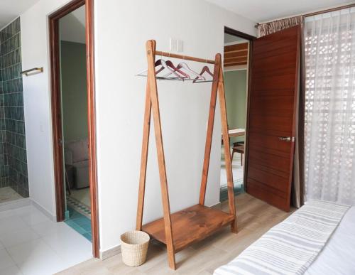 a room with a wardrobe and a mirror at Casa Martina Guest House in Pátzcuaro