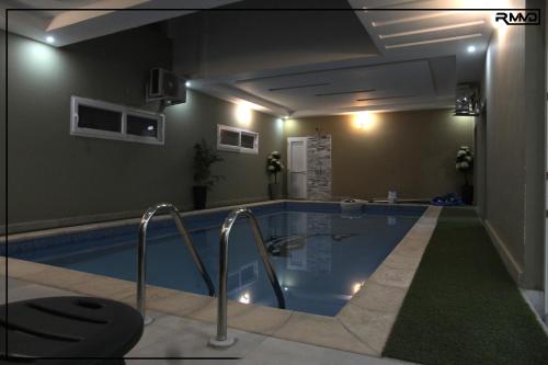 Bazén v ubytování Résidence RMD nebo v jeho okolí