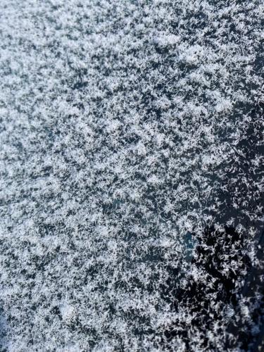 a large body of water with snow on it at Madarao Lainstons in Iiyama