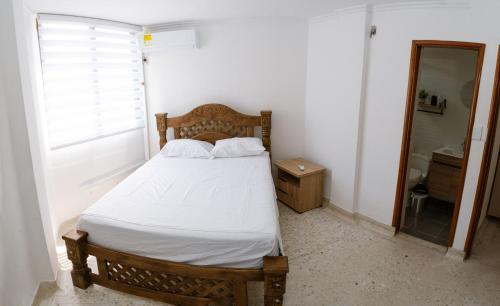 Postel nebo postele na pokoji v ubytování El Mirador del Lago