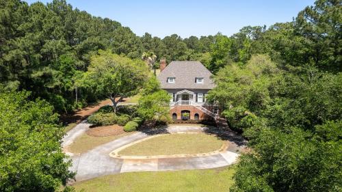 an overhead view of a house in the woods at Tranquil by the Sea home by Peace Vacations in Georgetown