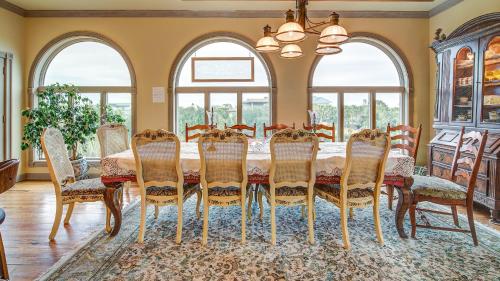 a dining room with a table and chairs at Mull Cottage home by Peace Vacations in Georgetown