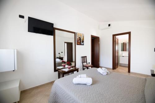 Postel nebo postele na pokoji v ubytování B&B Parcomonsignore