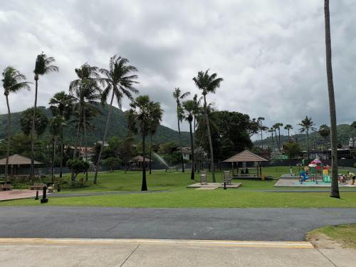 a park with palm trees and a skate park at 7 Floor - Mountain view Studio room at OZC near Kata beach in Kata Beach