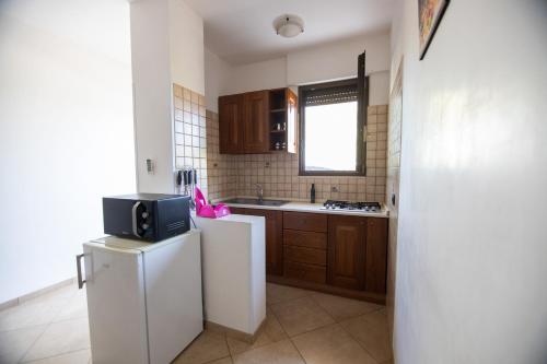 Kuchyň nebo kuchyňský kout v ubytování B&B Parcomonsignore