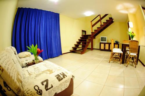 Un lugar para sentarse en Solar Pipa Apartments