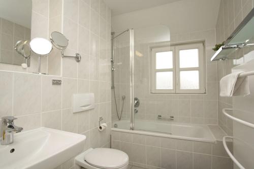 Koupelna v ubytování Feriendorf Bakenberg Ferienwohnung C27