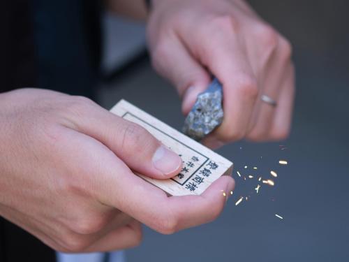 a person is holding a bar of sidx sidx sidx sidx at HOTEL SUI AKASAKA by ABEST in Tokyo