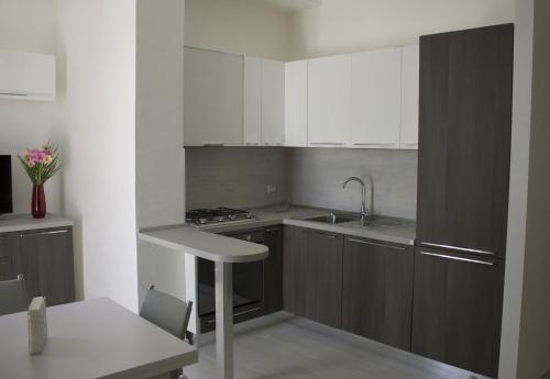 Kuchyň nebo kuchyňský kout v ubytování Alloggio turistico Vivaldi