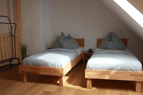 Postel nebo postele na pokoji v ubytování Maisonette im Zentrum Trofaiachs