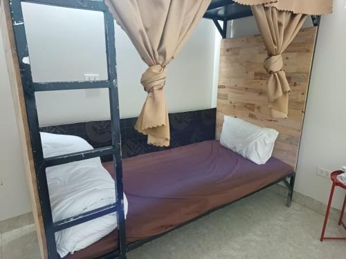 Кровать или кровати в номере Yolo Ha Giang Adventures, Motorbike and Loop Tours