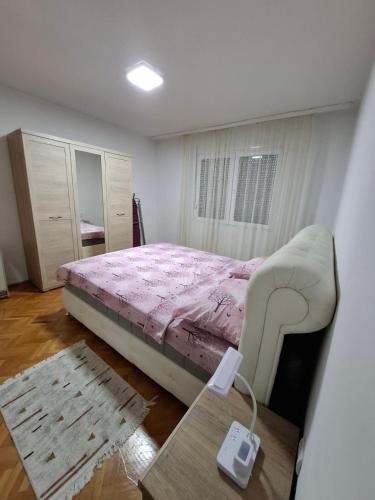 Postel nebo postele na pokoji v ubytování Apartment Vuk