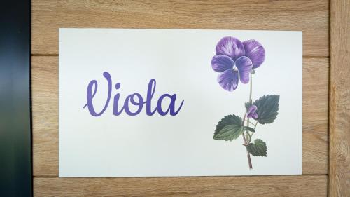 a thank you card with a flower on it at Agricamping Ai Prati in Lazise