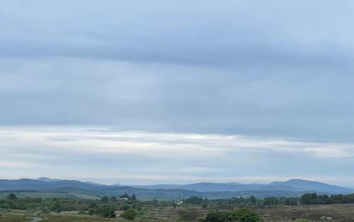 a view of the mountains and sky with clouds at Hillside Lodge in Letterkenny