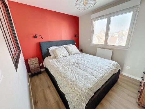 En eller flere senge i et værelse på Sky & sea