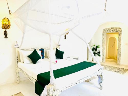 Postel nebo postele na pokoji v ubytování Dream Luxury B&b Watamu
