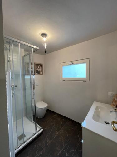 Ένα μπάνιο στο Residenza Grimerio