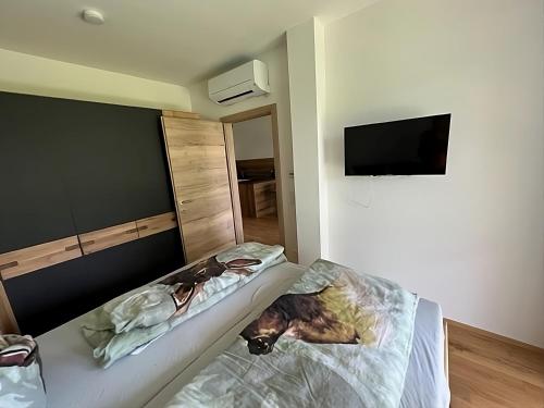 Ένα ή περισσότερα κρεβάτια σε δωμάτιο στο Wohlfühloase Gabriela