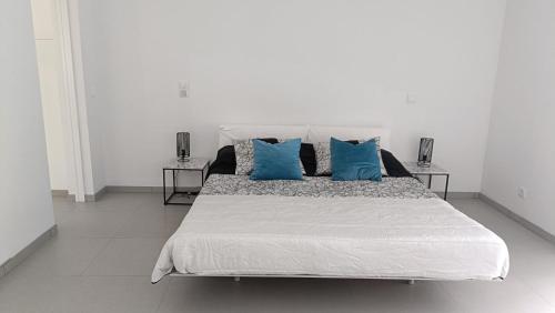 En eller flere senge i et værelse på Bella Casa - piso inferior