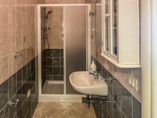 a bathroom with a sink and a shower at Hssoverato in Soverato Marina