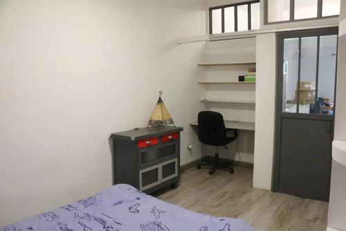 Un pat sau paturi într-o cameră la Le Madier