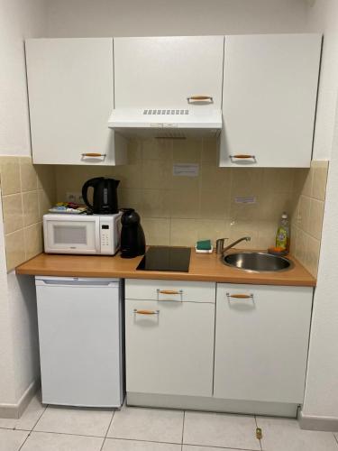 Dapur atau dapur kecil di Kimi Résidence