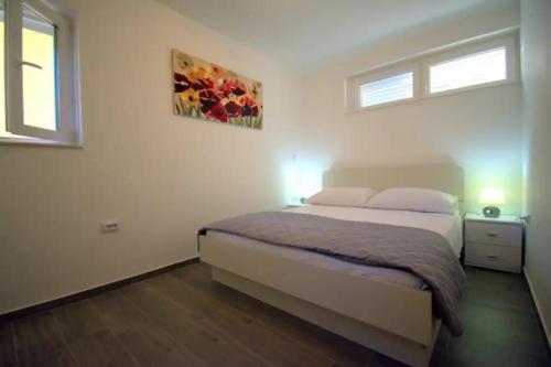 Postel nebo postele na pokoji v ubytování Valentina